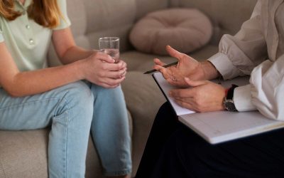 young-girl-talking-therapist-side-view